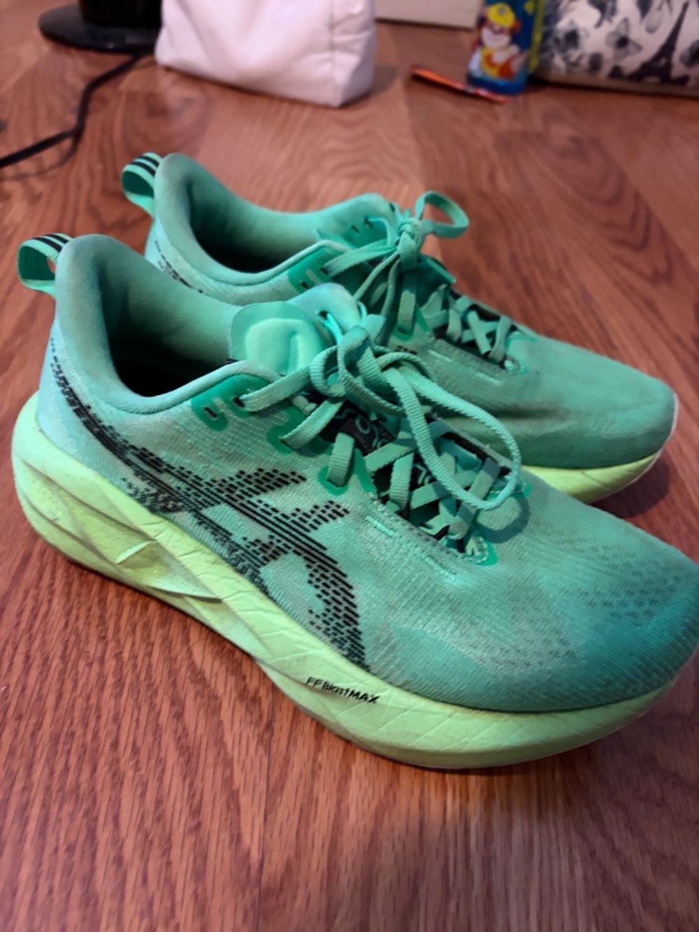 ASICS Women’s Teal Mint Athletic Running Shoes novablast 5